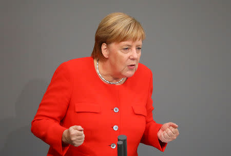 German Chancellor Angela Merkel speaks during a session at the lower house of parliament Bundestag in Berlin, Germany, September 12, 2018. REUTERS/Hannibal Hanschke
