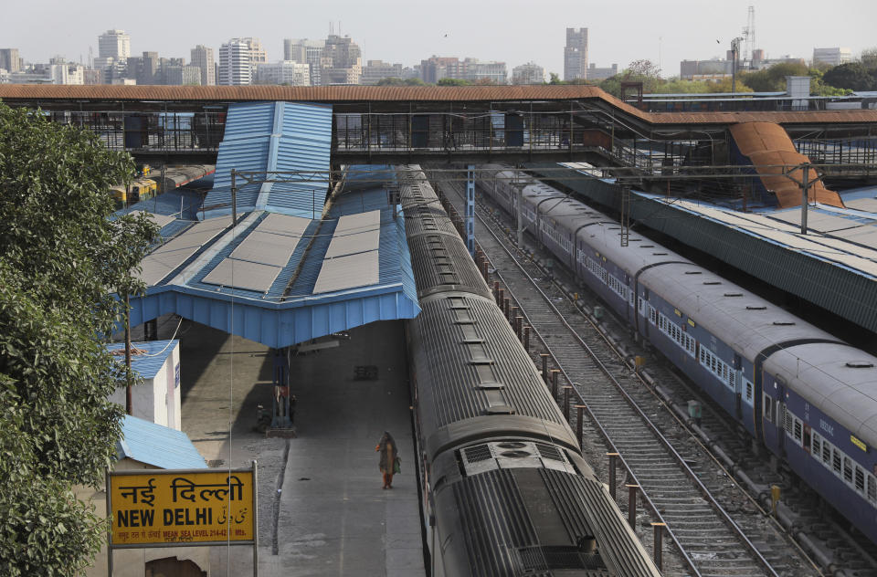 This March 23, 2020, photo shows a deserted New Delhi railway station during lockdown in India. India is set to re-open some parts of its colossal rail network on Tuesday, as the country looks at easing its nearly seven-week strict lockdown amid an increase in coronavirus infections. (AP Photo/Manish Swarup)