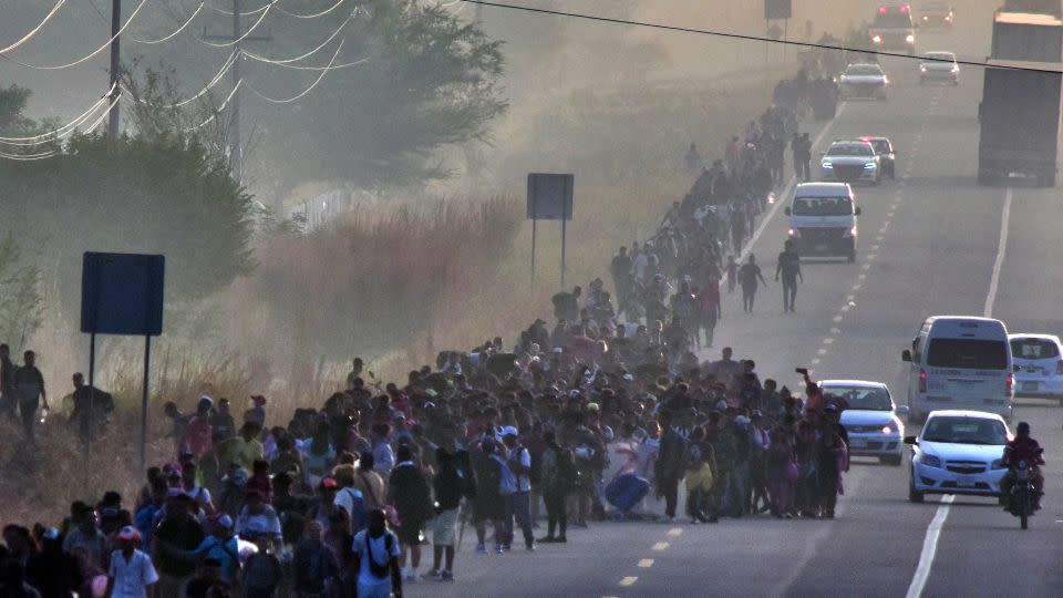Migrants take part in a caravan toward the border with the United States in Chiapas State, Mexico, on January 8, 2024. - Stringer/AFP/Getty Images
