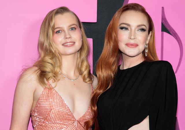 <p>KENA BETANCUR/getty</p> Angourie Rice and Lindsay Lohan at the 'Mean Girls' premiere
