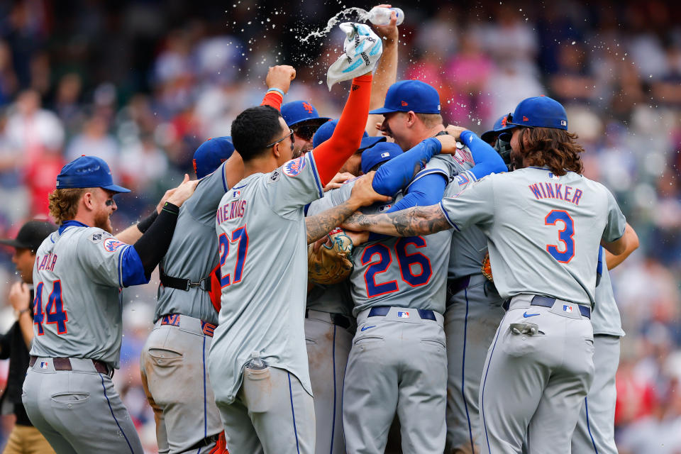 ATLANTA, GA - SEPTEMBER 30: Members of the New York Mets celebrate after defeating the Atlanta Braves at Truist Park on Monday, September 30, 2024 in Atlanta, Georgia. (Photo by Todd Kirkland/MLB Photos via Getty Images)