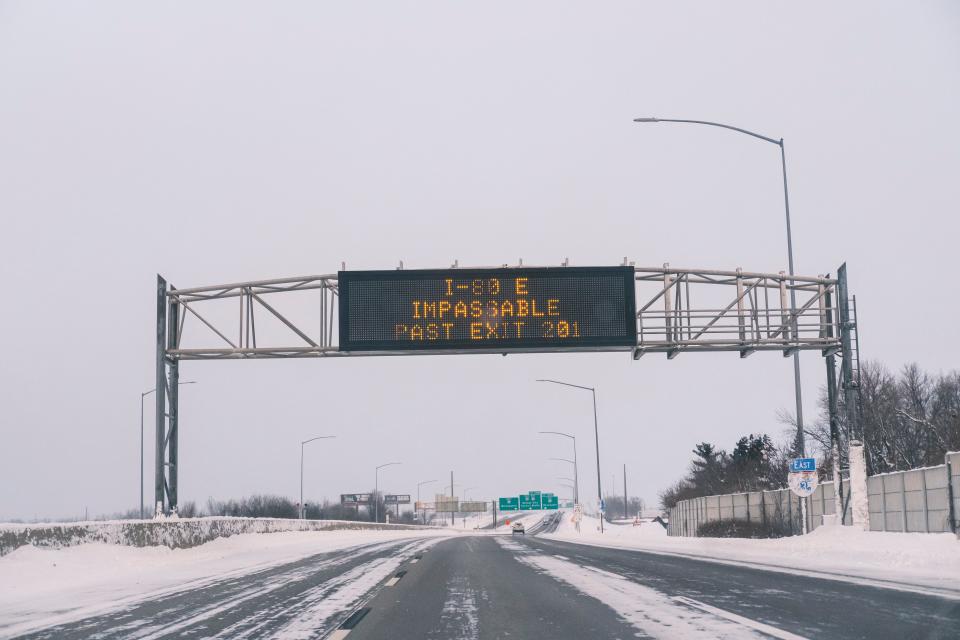 A road sign on Interstate 38- in Des Moines, Iowa advises that Interstate 80 is impassable due to weather in central Iowa on Saturday, Jan. 13, 2024. Heavy snow and high winds led the National weather service to issue a blizzard warning for much of the state of Iowa. (Nick Rohlman /The Gazette via AP) ORG XMIT: IACED601