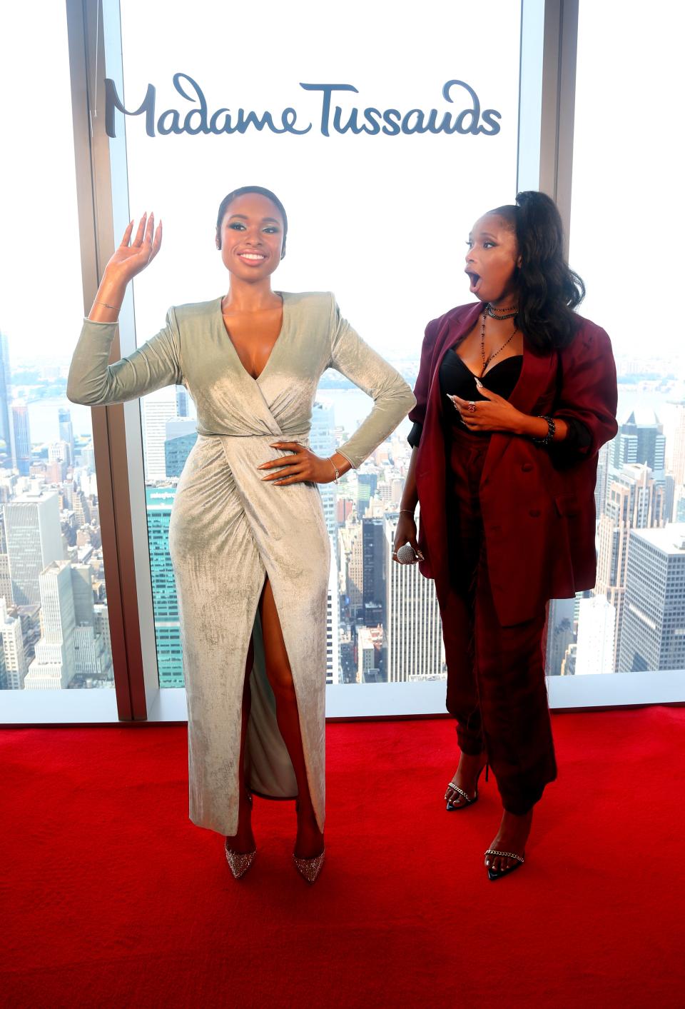 Jennifer Hudson celebrates the reveal of her wax figure, which is now featured at Madame Tussauds New York. - Credit: Madame Tussauds/ MEGA