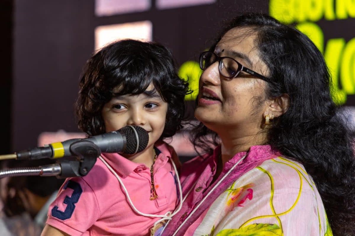 Kerala’s Pathanamthitta District Collector sparked an online debate after she delivered a speech at a public event holding her child in her arms (Facebook/District Collector Pathanamthitta)