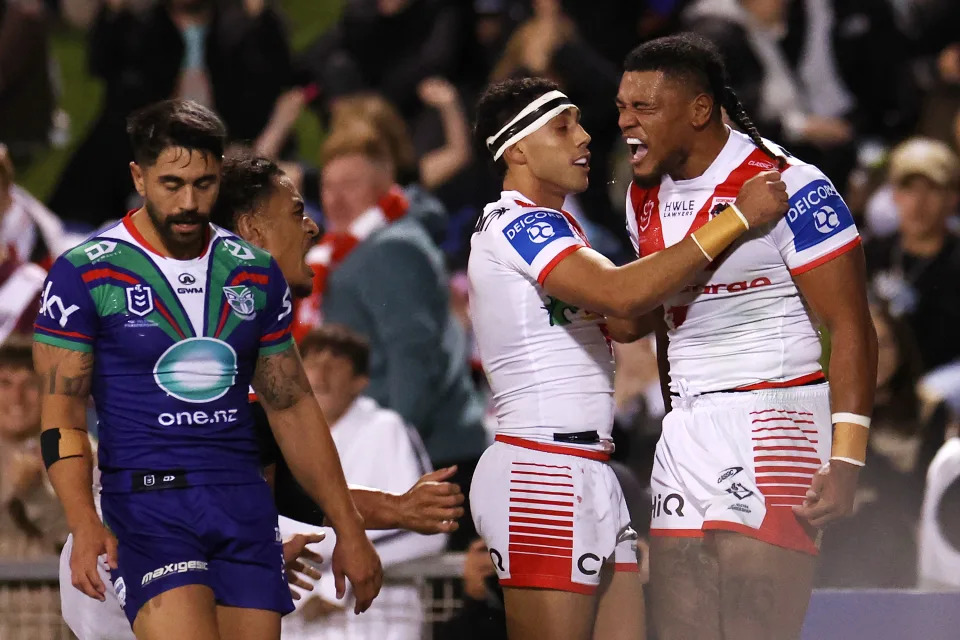 WOLLONGONG, AUSTRALIA - APRIL 19:  Moses Suli of the Dragons celebrates with team mates after scoring a try during the round seven NRL match between St George Illawarra Dragons and New Zealand Warriors at WIN Stadium on April 19, 2024, in Wollongong, Australia. (Photo by Mark Kolbe/Getty Images)