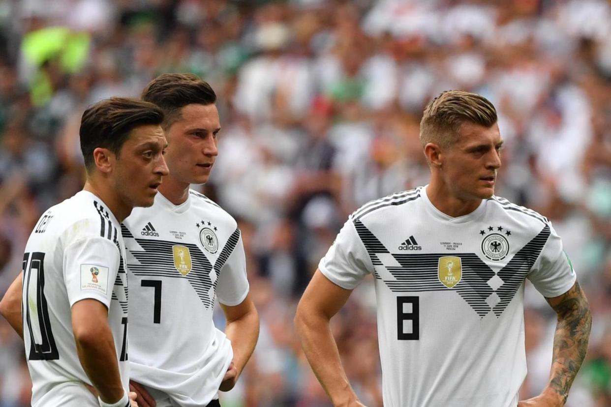 National divide:Toni Kroos with Mesut Ozil during Germany’s World Cup defeat by Mexico in June: AFP/Getty Images