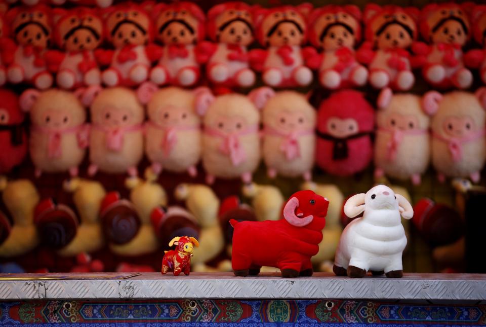 Toys are displayed at a vendor's shop at Ditan Park, also known as the Temple of Earth, in Beijing, February 16, 2015. The Chinese Lunar New Year on Feb. 19 will welcome the Year of the Sheep (also known as the Year of the Goat or Ram). (REUTERS/Kim Kyung-Hoon)