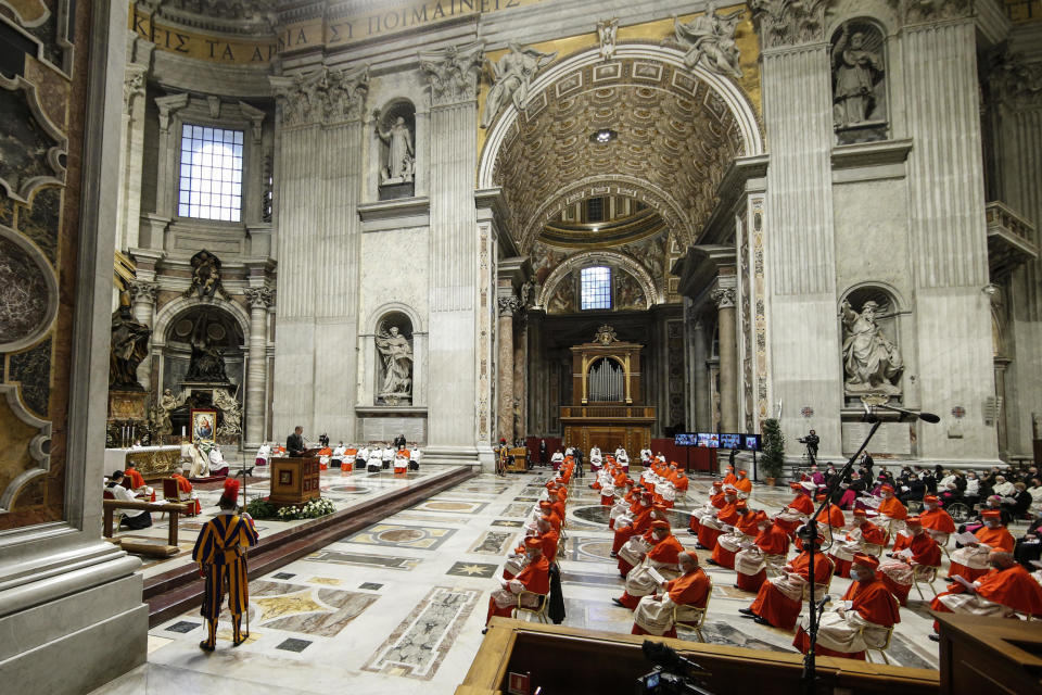 Pope Francis attends a consistory ceremony where 13 bishops were elevated to a cardinal's rank in St. Peter’s Basilica at the Vatican, Saturday, Nov. 28, 2020. (Fabio Frustaci/POOL via AP)