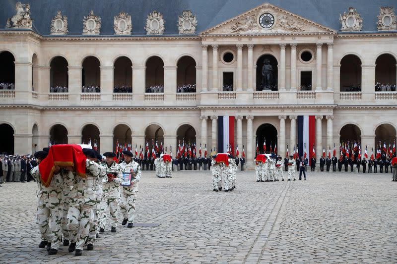 National ceremony in Paris to pay respect to the thirteen French soldiers killed in Mali