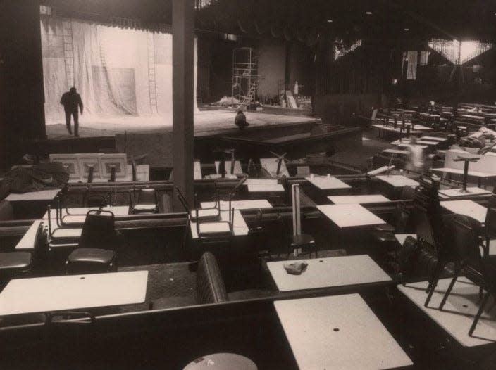 Workers prepare for the 1988 opening of the new Carousel Dinner Theatre in Akron.