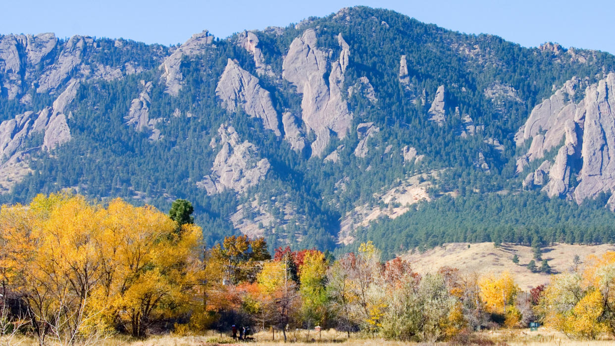 Boulders flatirons with the fall colors in the foreground. 
