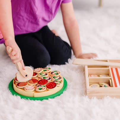 This Melissa and Doug wooden pizza set is perfect for little foodies. It can be yours with 30% off RN.