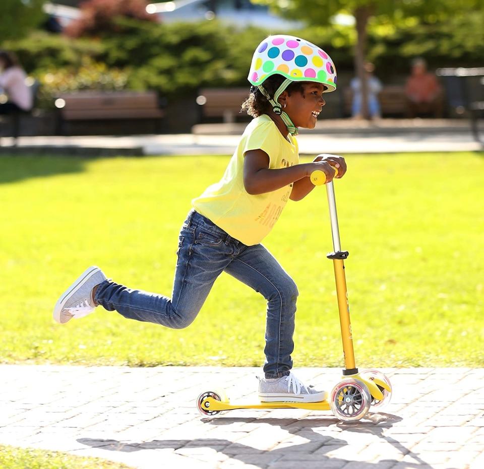 With an adjustable handlebar to grow with your toddler, this toy will be there as they improve their balance and motor skills. Also, it includes a two-year warranty.<br /><br /><strong>Promising review:</strong> "Best scooter ever! It&rsquo;s an easy assembly. It&rsquo;s a smooth ride and the perfect size for a 2-year-old. Spend more money and go with the deluxe model especially if your child is only 2. I brought this to the park today and two more of my mommy friends went home and bought their kids these today too! They come in the most beautiful colors. <strong>Kids are not really taught how to use these, they seem to just get on them and go!</strong> It was amazing to see my 2-year-old-take off like a champ!" &mdash; <a href="https://amzn.to/2QRViIB" target="_blank" rel="noopener noreferrer">TexSpaceman12</a>﻿<br /><strong><br />Get it from Amazon for <a href="https://amzn.to/2QRViIB" target="_blank" rel="noopener noreferrer">$89.99</a> (available in 12 colors).</strong>