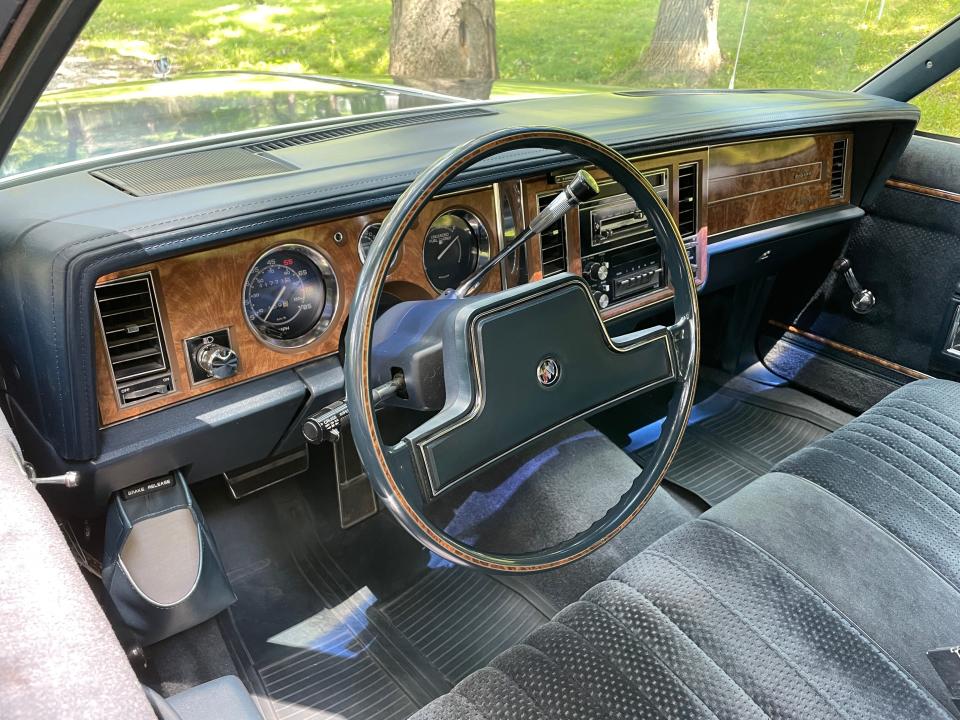 The dashboard and front seat in Rich Steininger's 1985 Buick LeSabre Estate Wagon