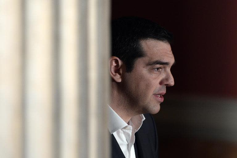 Greek Prime Minister Alexis Tsipras hopes EU talks on Greek debt will yield a "happy ending"