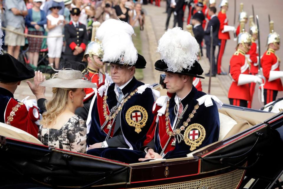 Prince William, right, Prince Andrew, second right, Prince Edward, left, and Edward's wife Sophie Countess of Wessex leave in a carriage (AP)