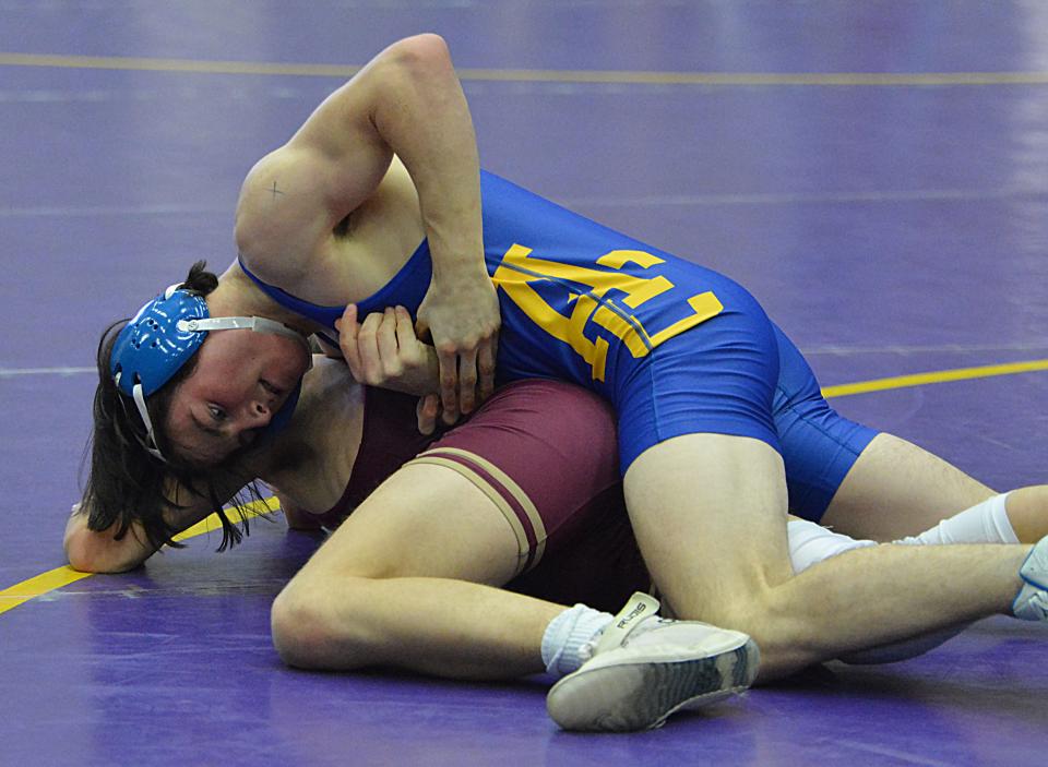 Aberdeen Central's Elias Biegler controls Milbank's Joe French at 157 pounds during the Marv Sherrill Dual wrestling tournament on Saturday, Dec. 2, 2023 in the Watertown Civic Arena.