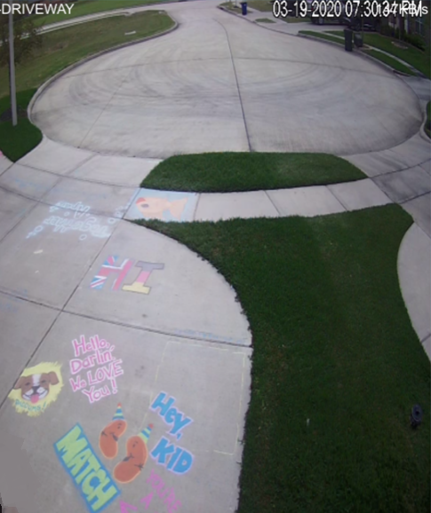 A shot of some of Shellie and Austin's creative chalk messages they left for Robert to see on their security cameras. (Photo: Shellie Callaway)