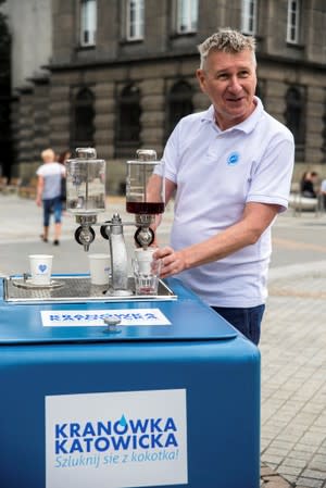 FILE PHOTO: Adam Grabowski serves fizzy water to locals in Katowice