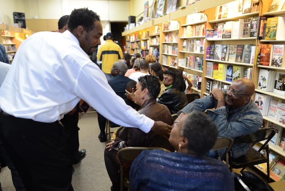 Rodney King greets fans in 2012 prior to the presentation of his autobiographical book 'The Riot Within...My Journey from Rebellion to Redemption' at the Eso Won Book Store in Los Angeles.