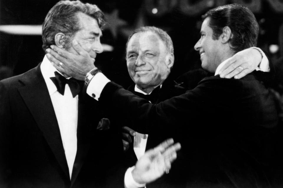 <p>Lewis reunited with Dean Martin (a truce brokered by Rat Pack kingpin Frank Sinatra) at the 1976 edition of his annual star-studded Labor Day telethon that raised millions for the Muscular Dystrophy Association and solidified Lewis’s reputation as a humanitarian. (Photo: Everett Collection) </p>