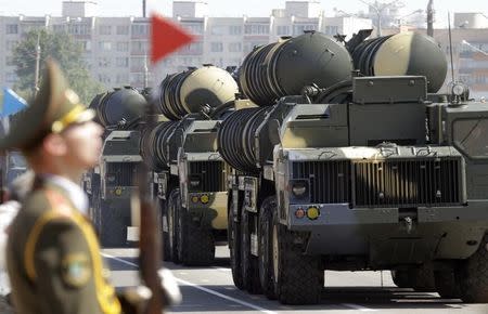 Belarusssian S-300 mobile missile launching systems drive through a military parade during celebrations marking Independence Day in Minsk July 3, 2013. REUTERS/Vasily Fedosenko