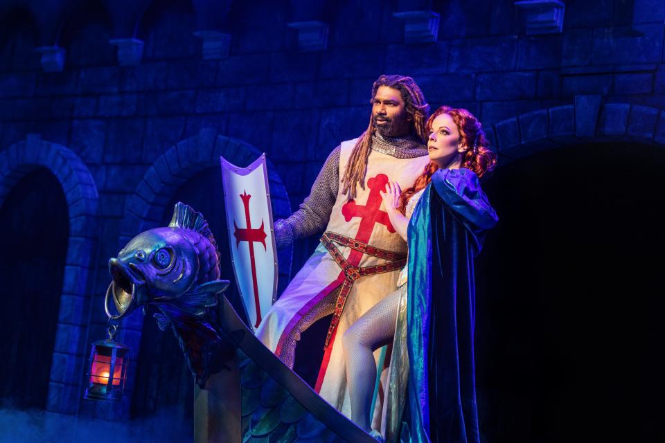 Nik Walker, left, and Leslie Rodriguez Kritzer frequently work current events into their nightly "Spamalot" ad libs.