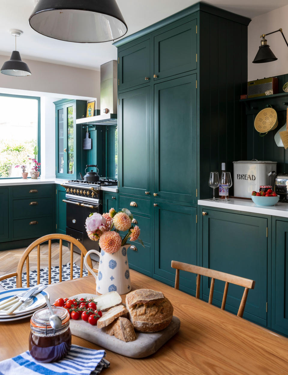 1. Paint your kitchen cabinets a pretty shade of emerald