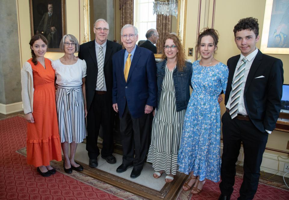 U.S. Senate Republican Leader Mitch McConnell with Ryan Corbett's family.