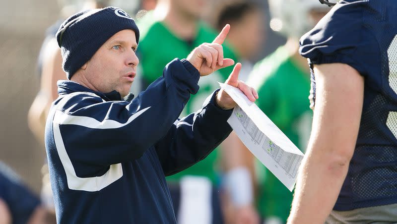 BYU tight ends coach Steve Clark instructs a player during a spring camp in Provo. Clark was instrumental in landing four-star tight end Ryner Swanson.