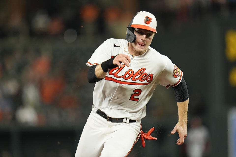 Baltimore Orioles' Gunnar Henderson runs the bases while scoring on a two-run single by Austin Hays in the eighth inning of a baseball game, Monday, Sept. 11, 2023 in Baltimore. The Orioles won 11-5. (AP Photo/Julio Cortez)