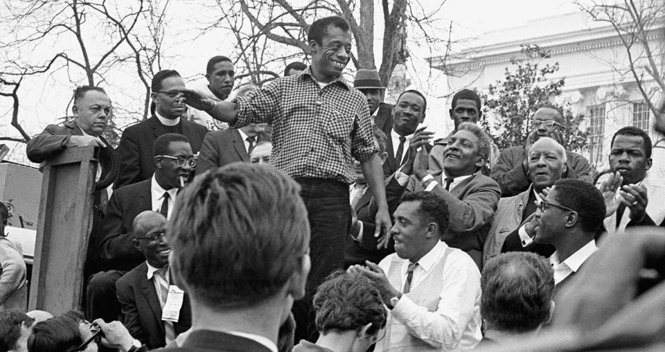 James Baldwin smiles while addressing a crowd participating in the march from Selma to Montgomery in support of voting rights, Alabama, March 1965. <span class="copyright">Robert Abbott Sengstacke—Getty Images</span>