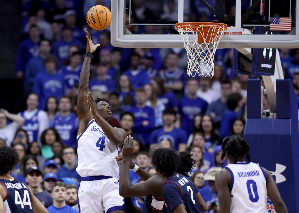 Seton Hall Pirates forward Tyrese Samuel (4) shoots the ball as Connecticut Huskies guard Tristen Newton (2) defends during the first half at Prudential Center. Mandatory Credit: Vincent Carchietta-USA TODAY Sports