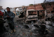 <p>An Afghan policeman inspects the site of a blast in Jalalabad, Afghanistan, Jan. 24, 2018. (Photo: Parwiz/Reuters) </p>