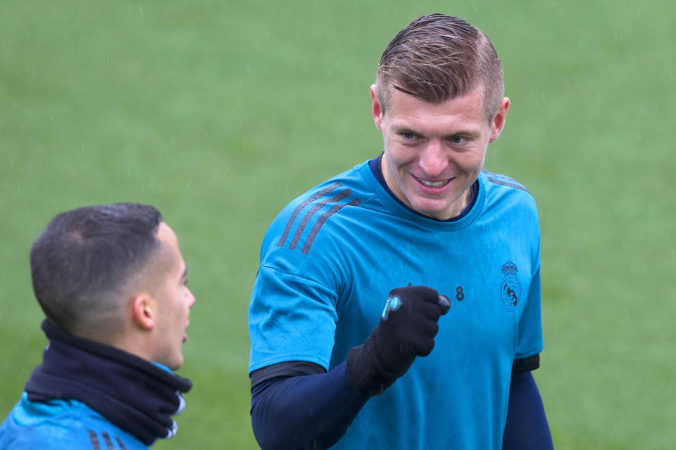 Real Madrid’s Toni Kroos, right, shares a word with teammate Lucas Vazquez during a training session in Madrid (AP Photo/Paul White)