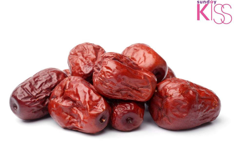 Dried jujube fruits on white background