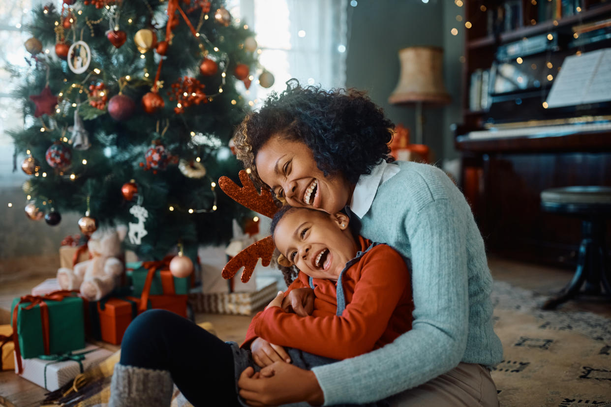 Not sure about Santa? Worried your kid is being greedy about gifts? Here's how parents can deal during the holidays. (Getty Images)