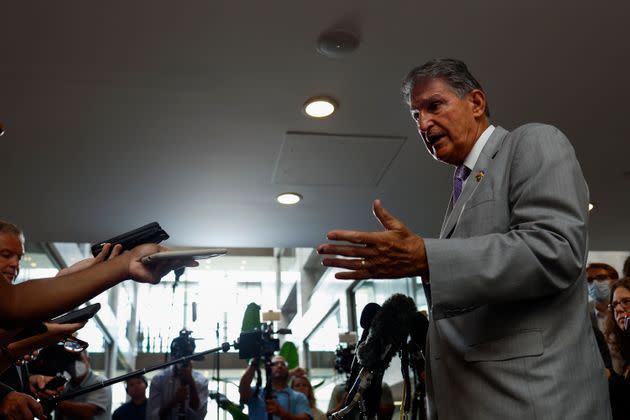 Sen. Joe Manchin (D-W.Va.) speaks to reporters outside his Senate office on Tuesday as negotiations continued on the Inflation Reduction Act. (Photo: Anna Moneymaker via Getty Images)