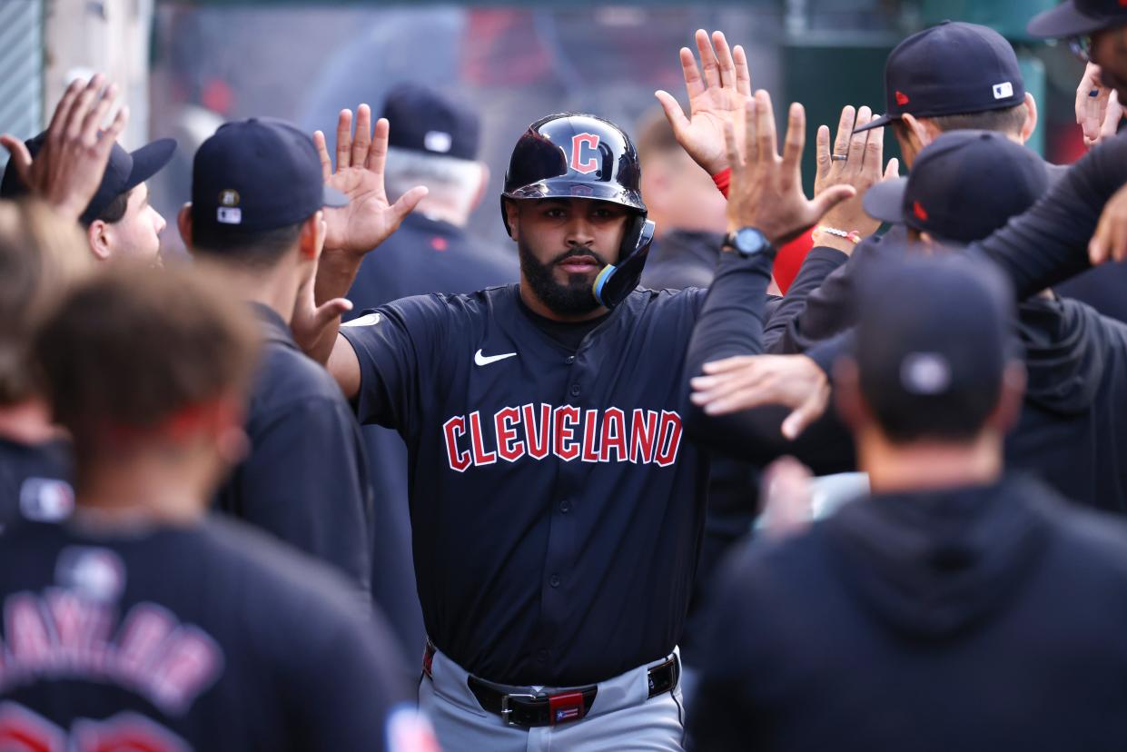 May 24, 2024; Anaheim, California, USA; Cleveland Guardians outfielder Johnathan Rodriguez (30) celebrates in the dugout after scoring on a wild pitch against the Los Angeles Angels during second inning of a game at Angel Stadium. Mandatory Credit: Jessica Alcheh-USA TODAY Sports
