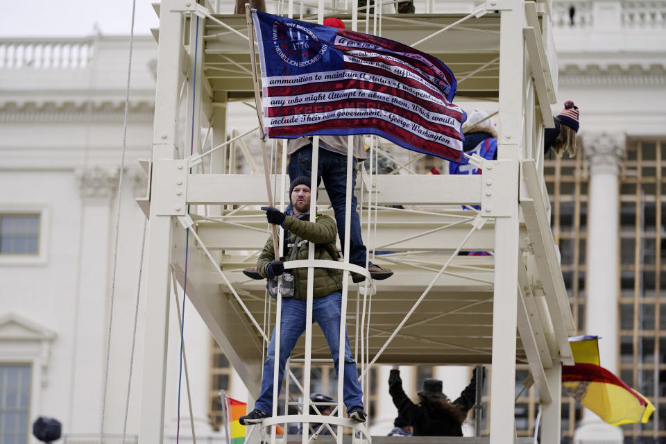 FILE - Insurrectionists loyal to President Donald Trump storm the U.S. Capitol, Jan. 6, 2021, in Washington. (AP Photo/Julio Cortez, File)