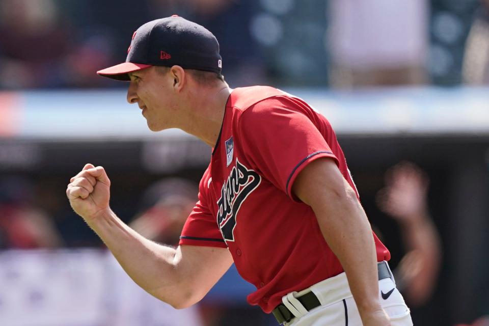 Cleveland Indians relief pitcher James Karinchak pumps his fist after the Indians defeated the St. Louis Cardinals 7-2 in a baseball game, Wednesday, July 28, 2021, in Cleveland. (AP Photo/Tony Dejak)