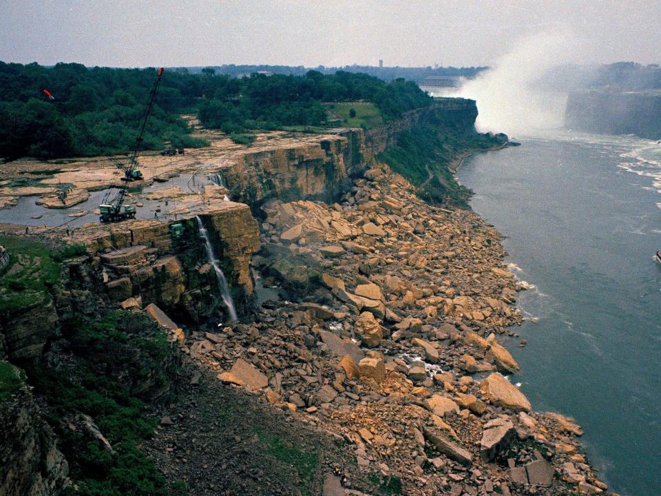 Niagara Falls dried up in 1969. A boat is seen in the water in the distance.