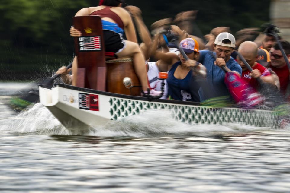 The DC Dragon Boat Club practices in the Washington Channel.