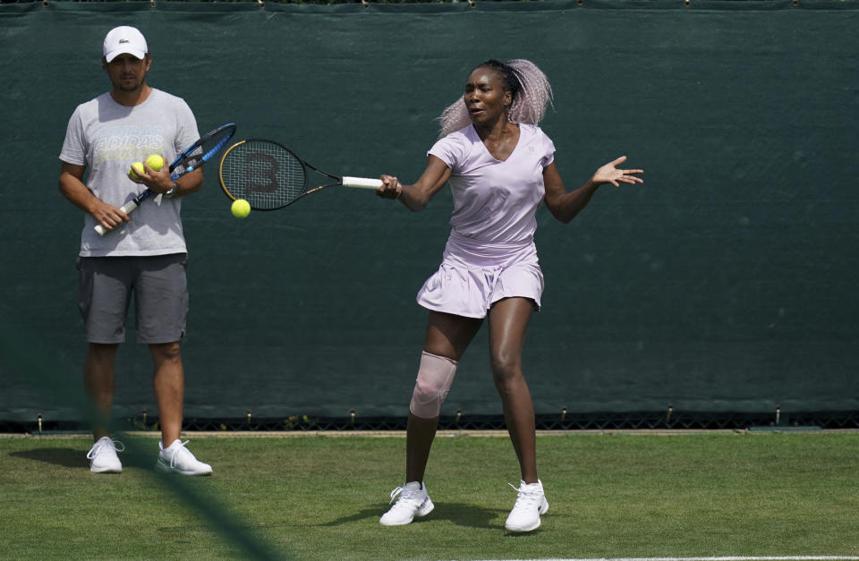 United States' Venus Williams practices at the All England Lawn Tennis and Croquet Club in Wimbledon, London, Britain, ahead of the championships starting tomorrow, on Sunday, July 2, 2023. (John Walton/PA via AP)