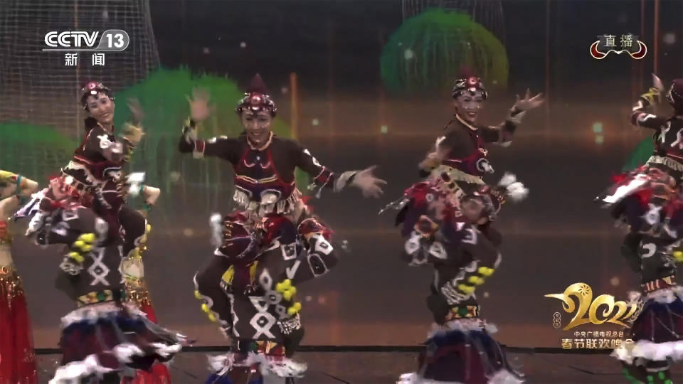 In this image taken from video footage run by China's CCTV via AP Video, dancers in blackface and costumes portraying Africans perform on stage during the Spring Festival Gala, one of the world's most-watched TV programs in Beijing on Friday, Feb. 12, 2021. (CCTV via AP)