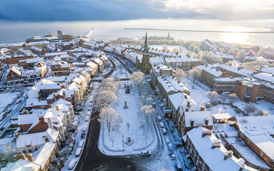 Snow blankets Tynemouth Front Street in the North East of England