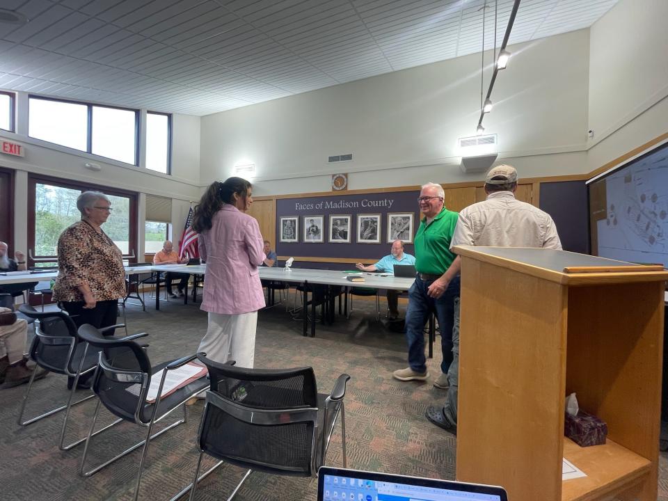 From left in the foreground are Ila Teague, a member of Laurel Fork Church, Saloua Lahlou, a meditation retreat center developer, and neighbors of the retreat center project Frank Sabatino and Brent Wise.