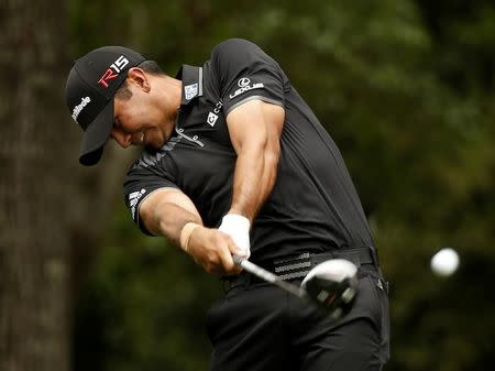 Jason Day of Australia hits a driver off the second tee during final round play of the Masters golf tournament at the Augusta National Golf Course in Augusta, Georgia April 12, 2015. REUTERS/Jim Young