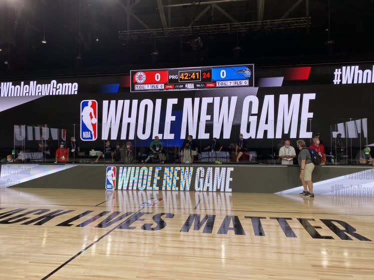 The Arena features "Black Lives Matter" painted on the court.