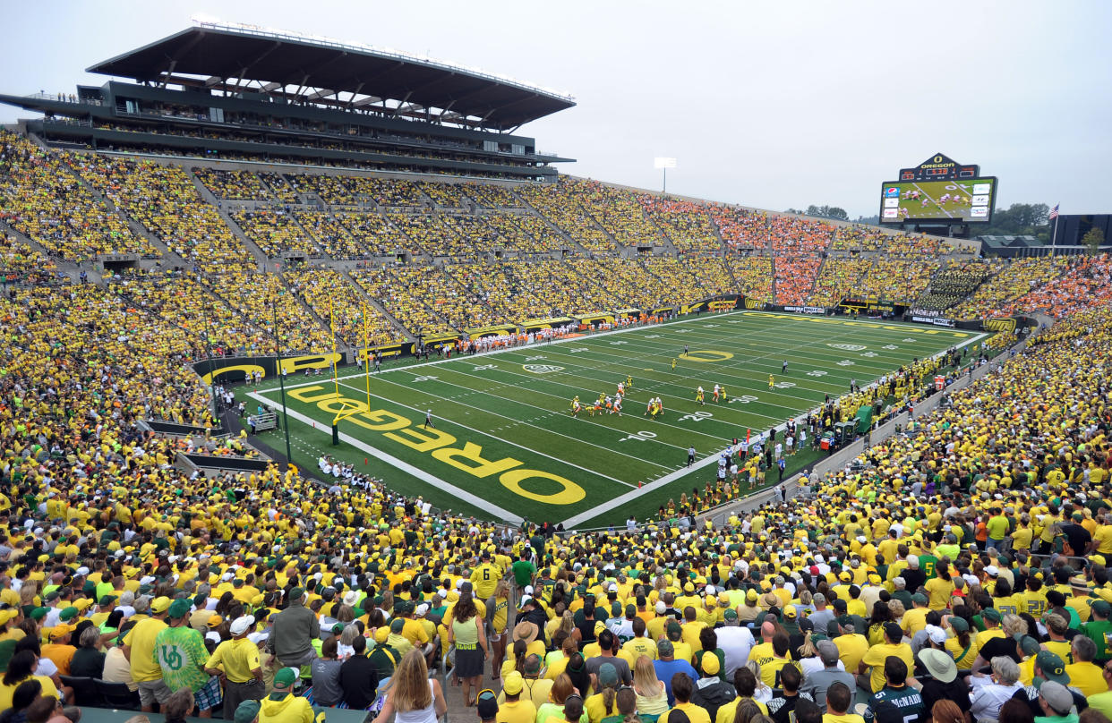 A general view of the crowd at Autzen Stadium during the third quarter of the NCAA college football game between the Oregon and the Tennessee in Eugene, Ore., Saturday, Sept. 14, 2013. Oregon won the game 59-14. (AP Photo/Steve Dykes)